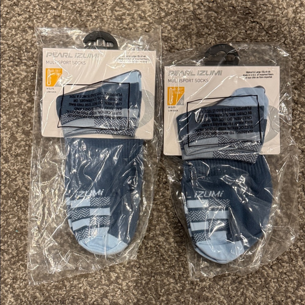 2 pair Pearl Izumi Multi-Sport Socks in Blue Shades. Brand new in package.